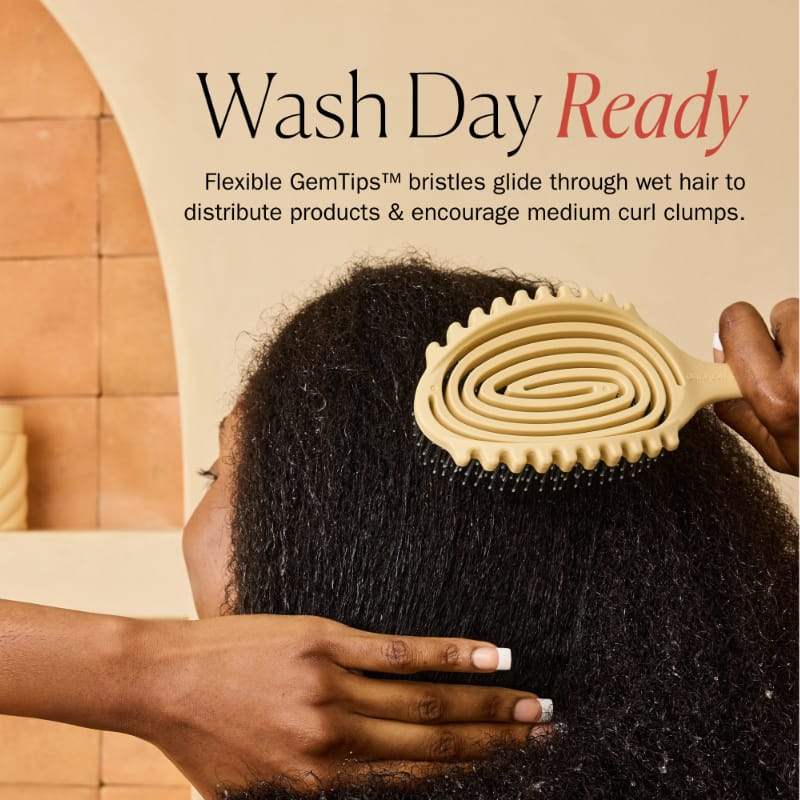 Wash Day Ready: Flexible GemTips™ bristle brush glides through wet curly hair to distribute products & encourage clumps.