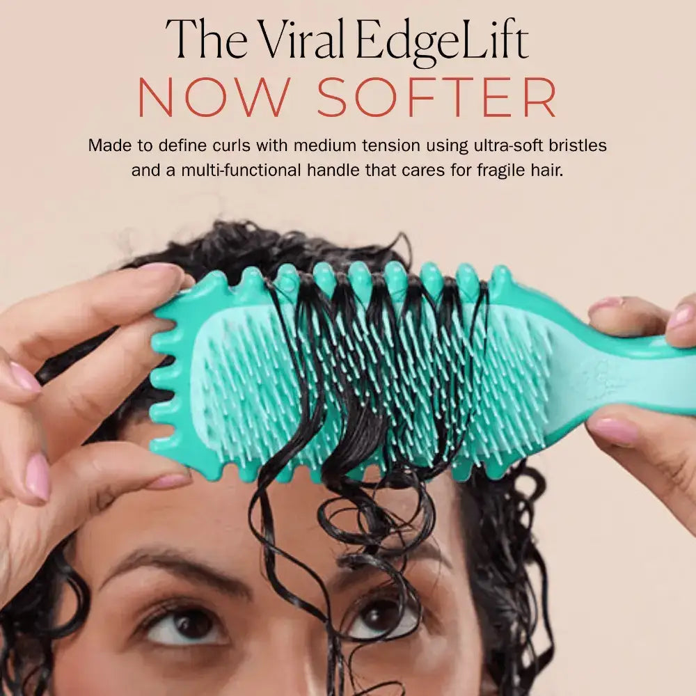 Teal curl defining brush with ultra-soft bristles for fragile curly hair styling